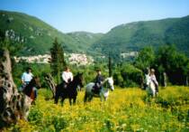Horse riding in the Corfu countryside with Ano Korakiana in the distance